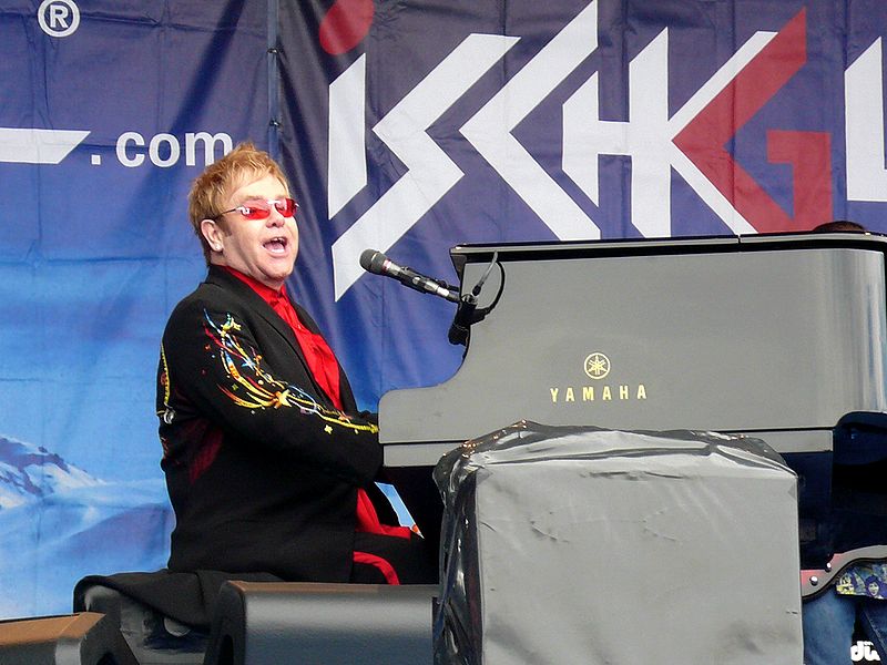Elton John playing at an event