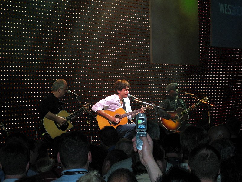 John Mayer performing with fellow musicians