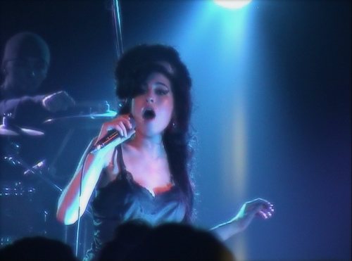 Amy Winehouse performing at a show in Berlin