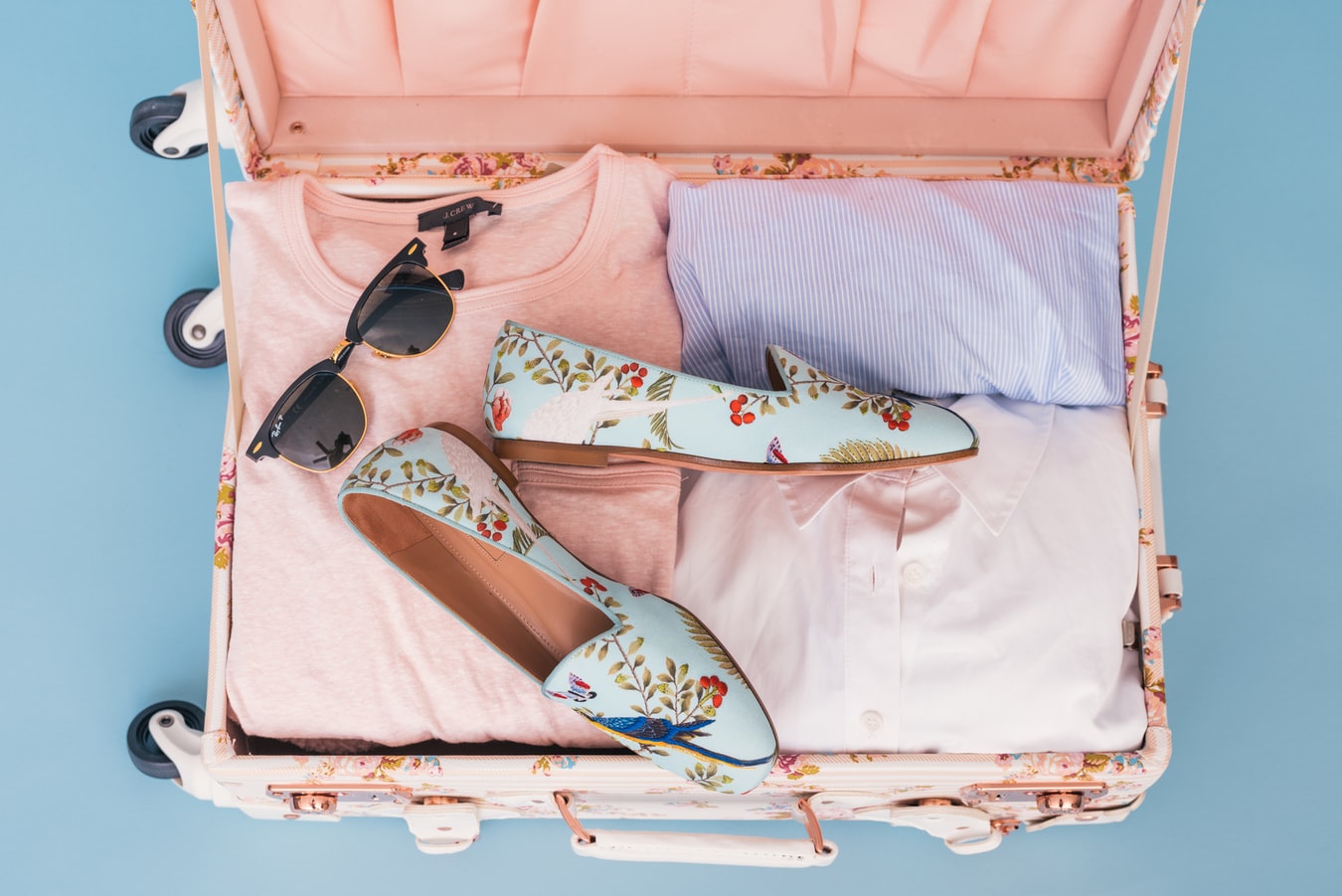A suitcase packed by a women who is moving into a sober living home