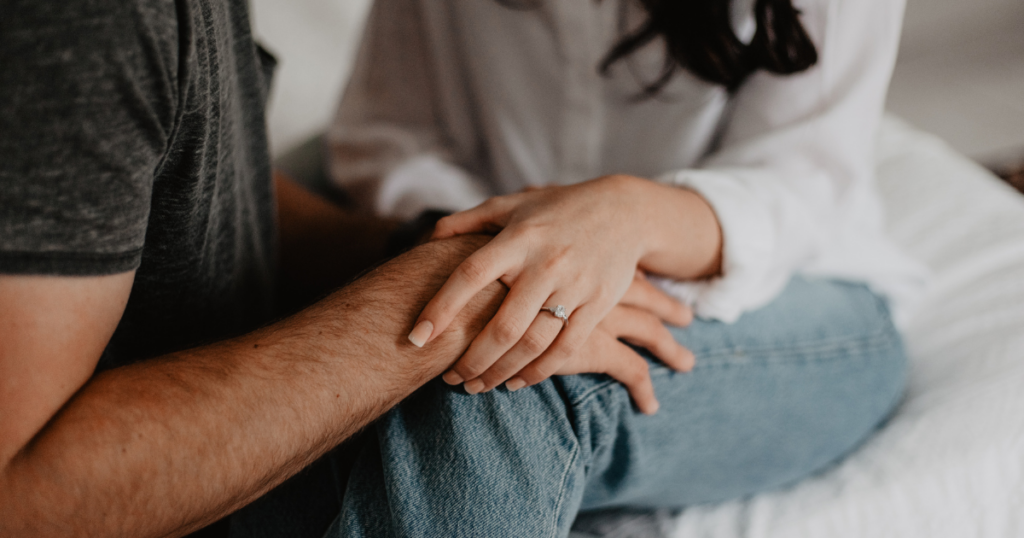 Holding hands during SMART Recovery. Attending family therapy and drug rehab in Indiana is one of the best things you can do for addiction recovery.