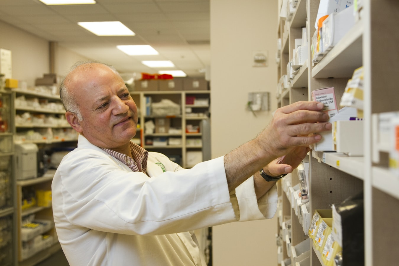 A pharmacist grabbing a paxil prescription for a patient