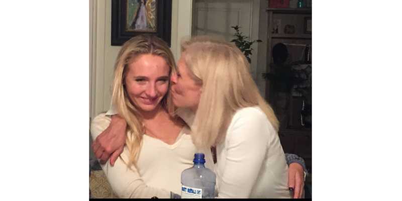 Betty Mason kisses her daughter Katy Mason, who died from a fatal overdose in 2016