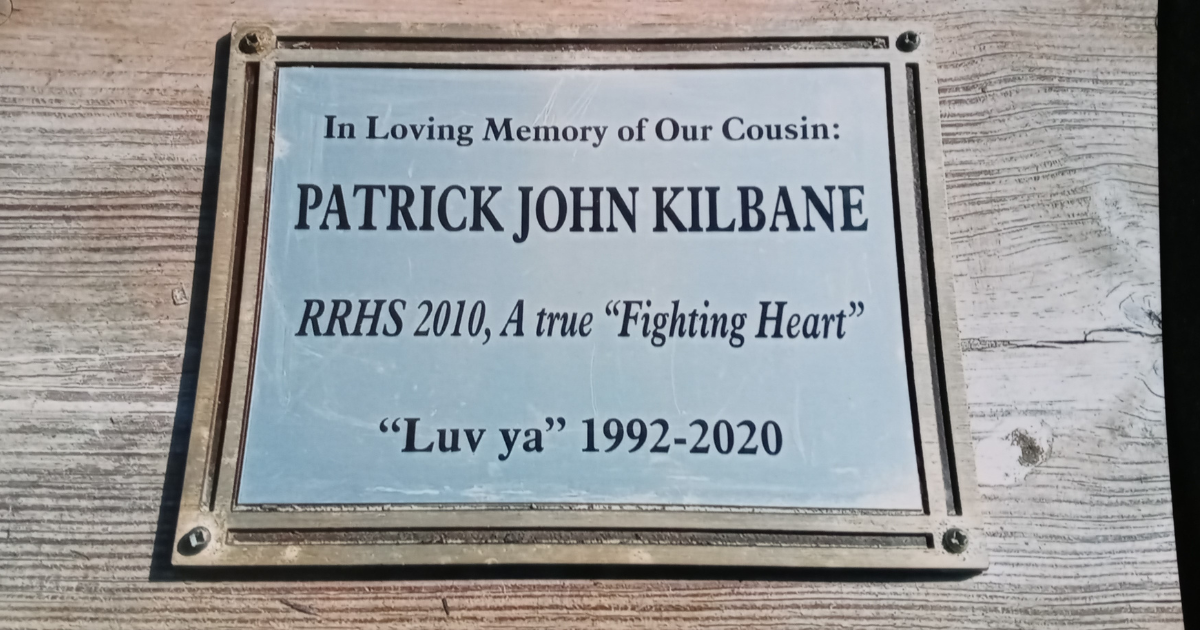 Patrick's cousin planted a tree in his memory, where this memorial plaque now sits