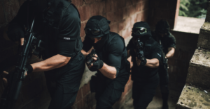 A police SWAT unit infiltrating low-income housing to reach the criminal distributor of Opana pills from Endo Pharmaceuticals.
