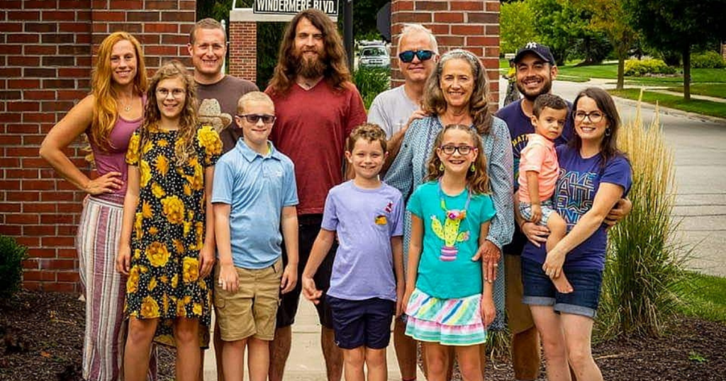 luke lines is pictured in the middle with his family