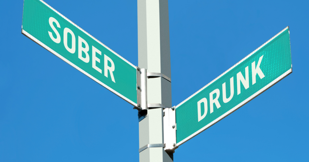 a street sign with sober and drunk on them to signal a crossroads for alcohol intoxication